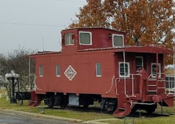 The restored red T&P caboose in Wills Point